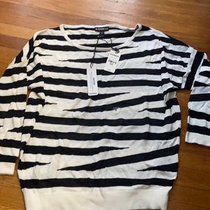 New with tags, size med, 100% rayon